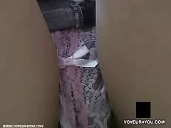 Is sandwiched between the two men