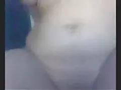 Hairy pussy on the background of a burning candle