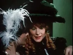 And why is she wearing a tie when the point vdul!?