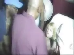 African american baby plays with a man in front of her friend
